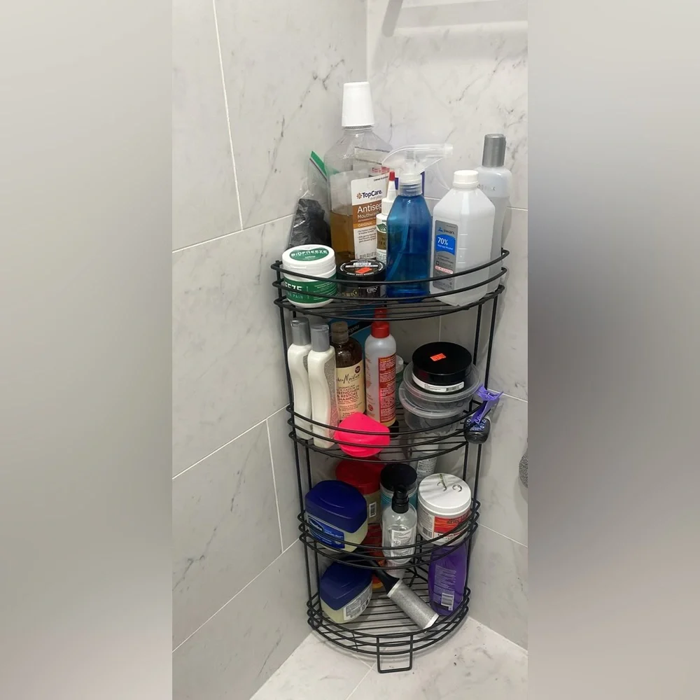 Bathroom organizer with triangular fit for corner placement.
